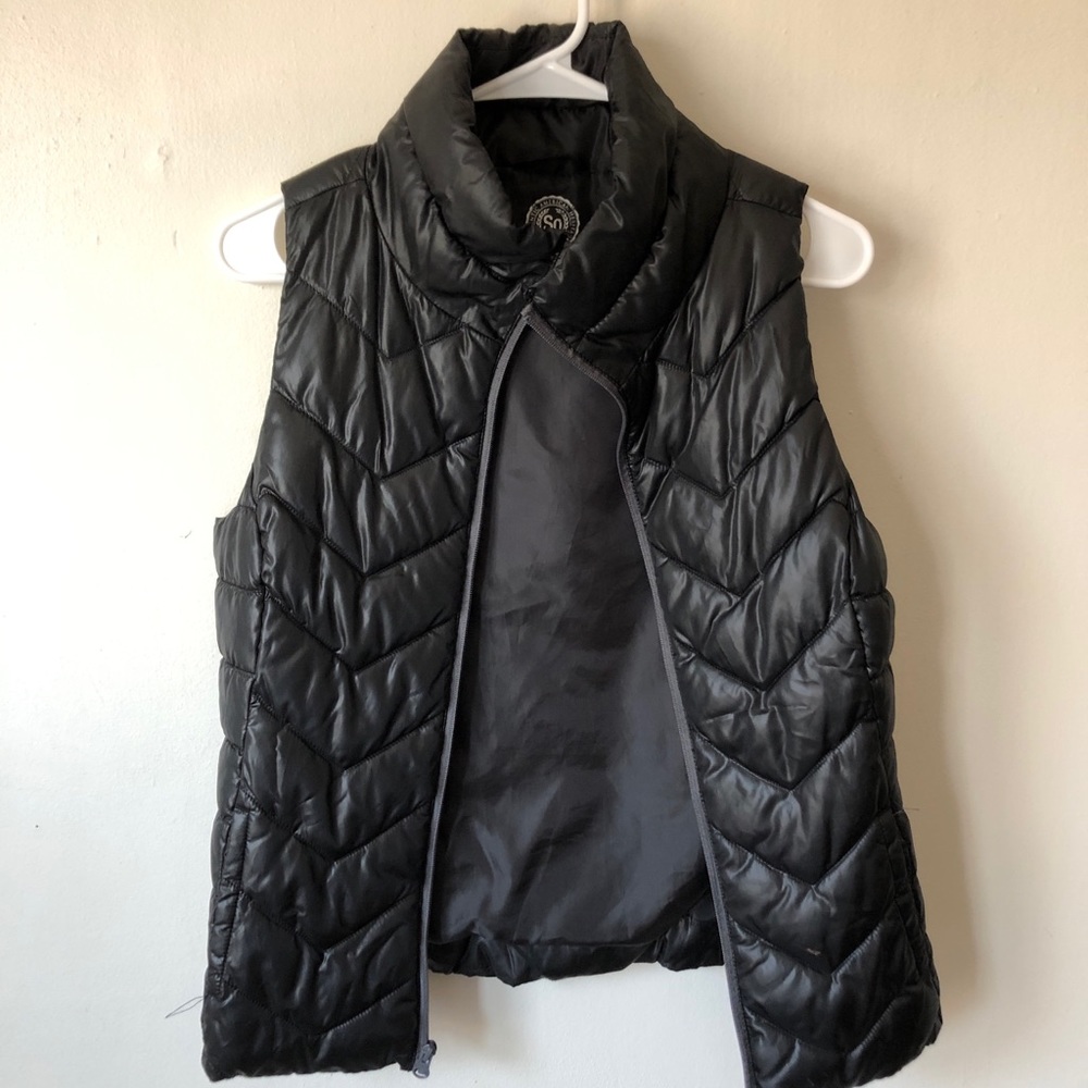 black puffy vest